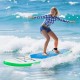 Young woman surfing on an 11 feet inflatable stand up paddle board with a non-slip deck in ocean waves.