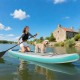11-foot inflatable stand-up paddle board with a dog, featuring a non-slip deck and center fin for stability on water.