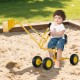 Yellow sand digger for kids featuring a backrest, adjustable controls, and wheels for easy movement in the sand.