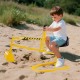 Yellow sandbox toy digger with adjustable arms and flexible shovel, designed for kids' outdoor play and motor skill.