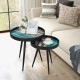 Nesting end table with a unique wooden tray top and sturdy black steel legs, ideal for stylish home decor.