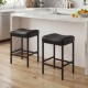 Close-up of the faux leather seat on a black 25-inch counter height bar chair, offering comfort and easy cleaning.