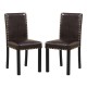 Set of 2 dining chairs with faux leather upholstery and nailhead accents, ideal for kitchen or dining areas.