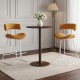 Set of 2 armless counter height stools with padded orange corduroy seats, ideal for 34"-36" high tables.