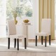 Set of 2 mid-century modern dining chairs in beige fabric with rubber wood frames, perfect for elegant dining spaces.