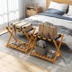 Set of 2 folding luggage racks with acacia wood frame, nylon straps, and slatted storage shelf for bedroom organization.