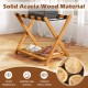 Folding luggage rack made of solid acacia wood with 5 nylon straps and slatted storage shelf, ideal for guest rooms.