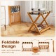 Set of 2 folding luggage racks with acacia wood frame, nylon straps, and slatted shelf, ideal for bedroom organization.