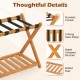 Folding luggage rack with acacia wood frame, 5 nylon straps, and slatted shelf, perfect for guest rooms or hotels.