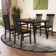 Black armless dining chair with a slightly concave seat and sturdy rubber wood legs, ideal for supportive kitchen.