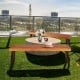 Set of 2 patio acacia wood dining benches with sturdy steel legs, perfect for outdoor dining and relaxation.