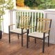 Side view of a patio dining chair with a removable cushion and durable acacia wood armrests, ideal for outdoor.