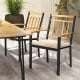 Set of 2 patio dining chairs with acacia wood armrests and removable cushions, perfect for outdoor dining comfort.
