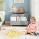 Gray wooden mobile toy storage organizer with bookshelf, lockable wheels, and large storage space for kids' items.