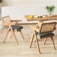 Side view of a rattan accent chair with gray padded cushion and rubber wood frame, ideal for stylish and comfortable.
