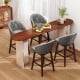 Set of 2 gray swivel bar stools with rubber wood legs, featuring padded backrests and stylish rivets for kitchen or pub.