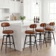 Set of 2 brown faux leather swivel barstools with padded seats and curved backrests, perfect for kitchen islands.