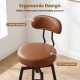 Curved backrest and padded seat of a brown faux leather swivel barstool, designed for comfort and style in any kitchen.