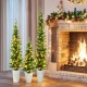 Set of 3 pre-lit artificial Christmas trees with warm white LED lights, ideal for festive home decoration.