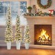 Set of 3 pre-lit snow flocked artificial Christmas trees in metal pots, featuring warm white LED lights for festive.