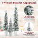 Set of 3 pre-lit snow flocked artificial Christmas trees with 423 branch tips, perfect for festive holiday decoration.