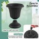 Black vintage planter with pedestal base, 18 inches tall, featuring a pre-marked drainage hole for versatile use.