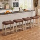 Set of 4 upholstered counter height bar stools with curved saddle-seat in brown, perfect for kitchen or bar use.