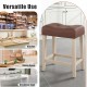 Upholstered counter height bar stool with curved saddle seat, natural rubber wood frame, ideal for kitchen or dining.