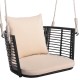 Single person hanging seat with woven rattan backrest and soft cushions, perfect for backyard relaxation.