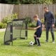 Backyard soccer goal set with a 6 ft x 4 ft metal frame, featuring a durable net and anchoring system for stability.
