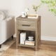 Nightstand with drawer and shelf in natural finish, featuring farmhouse style and spacious tabletop for living room or.