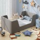 Gray soft velvet toddler bed frame with safety rails, featuring sturdy wooden slats and a cozy design for comfort.