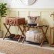 Solid rubberwood folding luggage rack set of 2 with nylon shelves, perfect for organizing shoes and travel accessories.