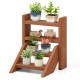 Solid wood plant stand with four tiers, featuring a waterproof finish, perfect for displaying flowerpots and succulents.