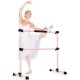 Ballet dancer using a pink portable freestanding barre with adjustable height for safe stretching and practice.