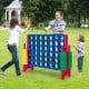 Jumbo 4-to-Score Giant Game Set with colorful rings, perfect for outdoor parties and improving children's motor skills.