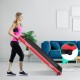 Folding treadmill in red, designed for under-desk use and running, featuring transport wheels and remote control.