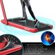 Folding treadmill with red frame, showcasing the multi-layer shock-absorbing running belt for comfortable workouts.