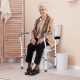 Steel safety toilet rail with adjustable height, sturdy frame, and soft armrests for elderly and disabled support.