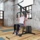 Multifunction Cross Trainer Workout Machine featuring a user performing seated exercises, perfect for versatile home.