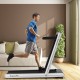 Folding treadmill with remote control, featuring a runner at 10.5mph, ideal for home fitness and under-desk use.