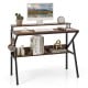 Rustic brown computer desk with monitor stand, extra storage shelf, and hanging hook for workspace organization.