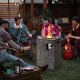 Square outdoor propane fire pit with lava rocks, 30,000 BTU, perfect for patio gatherings and weather-resistant.