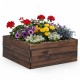 Square raised garden bed made of fir wood, featuring vibrant flowers, perfect for growing vegetables and herbs.