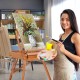 Wooden tripod easel with sketch box, adjustable height, ideal for indoor or outdoor painting and drawing.