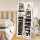 Jewelry cabinet in white showcasing a foldable makeup shelf and LED mirror, designed for stylish organization and.