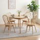 Set of four Swivel Windsor dining chairs in natural rubber wood, featuring a spindle back and wide seats for comfort.