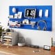 Navy wall-mounted pegboard kit with three 16" x 23.5" boards, hooks, shelves, and accessories for organized tool.