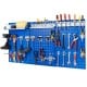 Navy wall-mounted pegboard kit with tools organized, featuring 3 pegboards and assorted hanging accessories for garage.