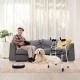 Folding height adjustable walking frame with armrest support, silver, shown in a living room for elderly mobility.